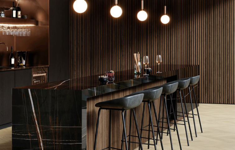 Comptoir moderne avec îlot central et éclairage LED, conçue par Arca Menuiseries.